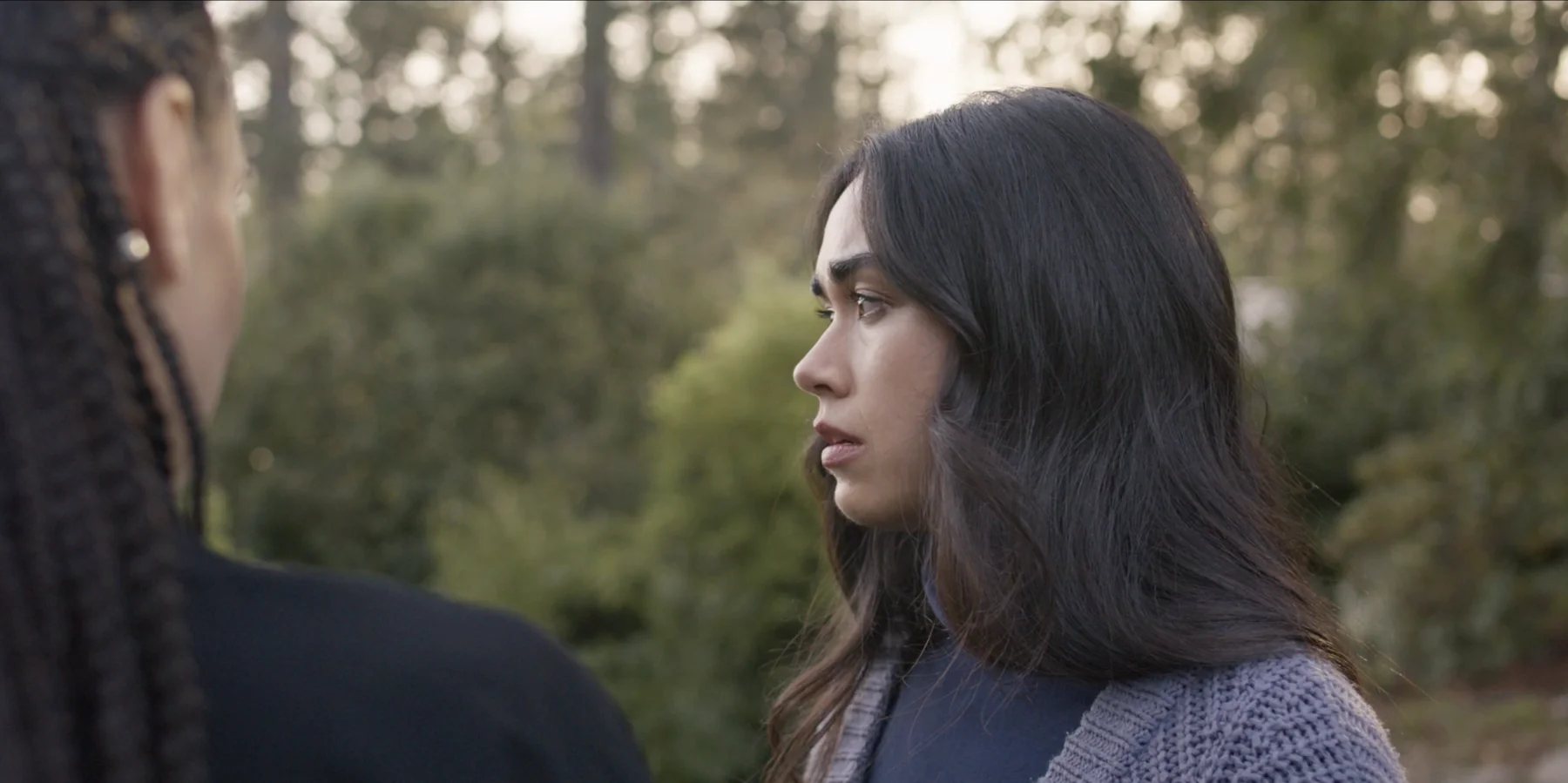 Albedo film still — Emily face to face with the protector