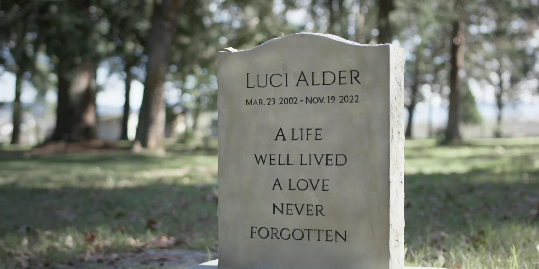 Albedo film still — Luci's headstone